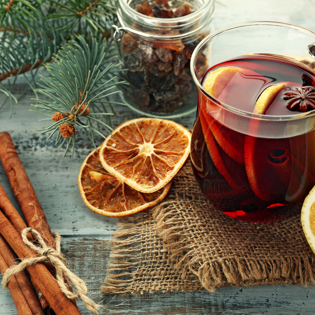 Flavours of Christmas Cognito Spa Flavours Mulled Pear & Cranberry with glass of mulled wine, cinnamon sticks, cloves and dried orange. 